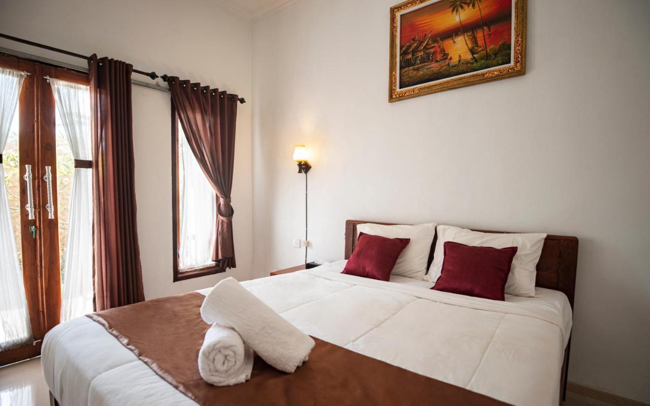 Santhi Guna Bungalow Toyapakeh Kültér fotó